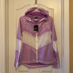 Purple and white Nike running jacket.